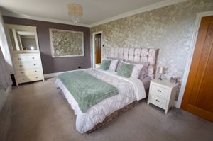 Bedroom One- click for photo gallery